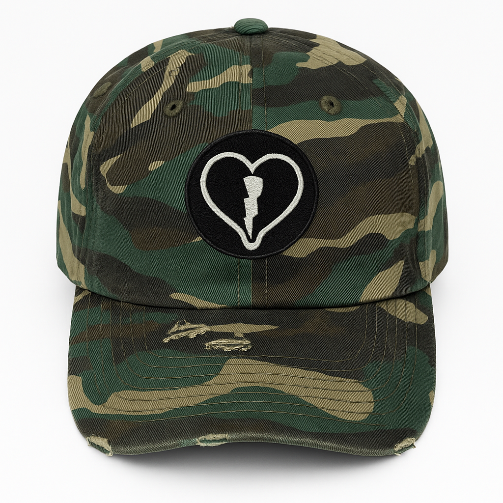Distressed camo cap featuring the official Liveblackheart chenille heart and lightning bolt logo, lifestyle streetwear brand Every Heart Has A Story.