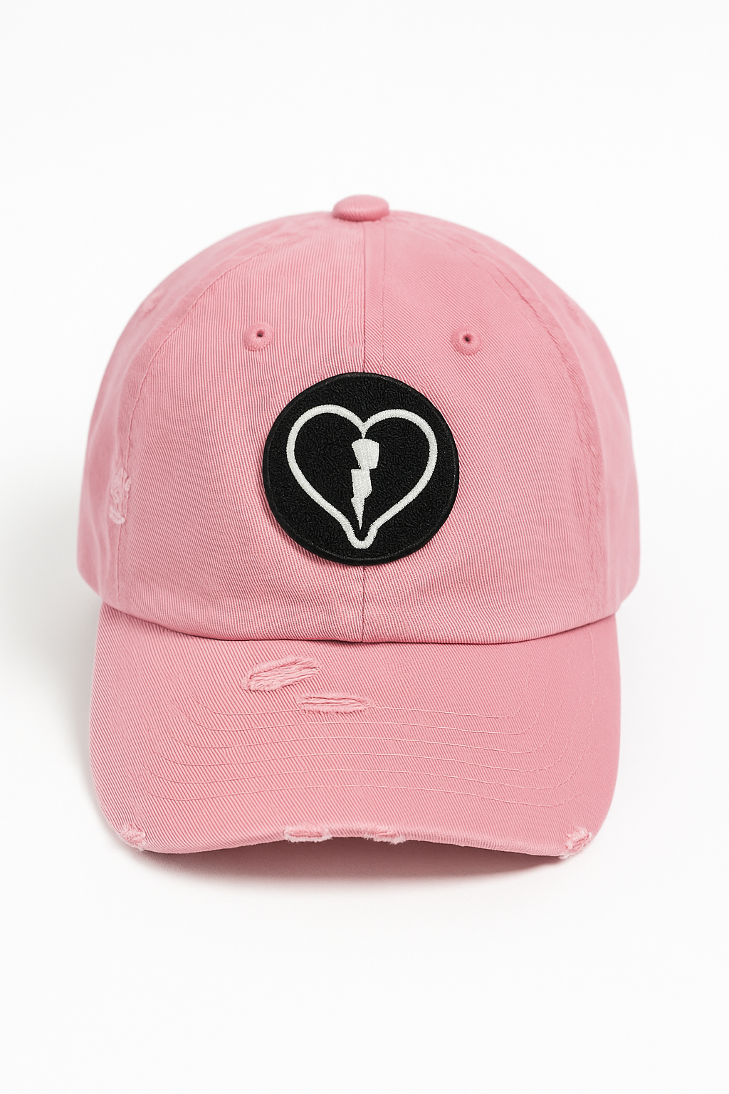 Distressed pink cap featuring the official Liveblackheart chenille heart and lightning bolt logo, lifestyle streetwear brand Every Heart Has A Story.