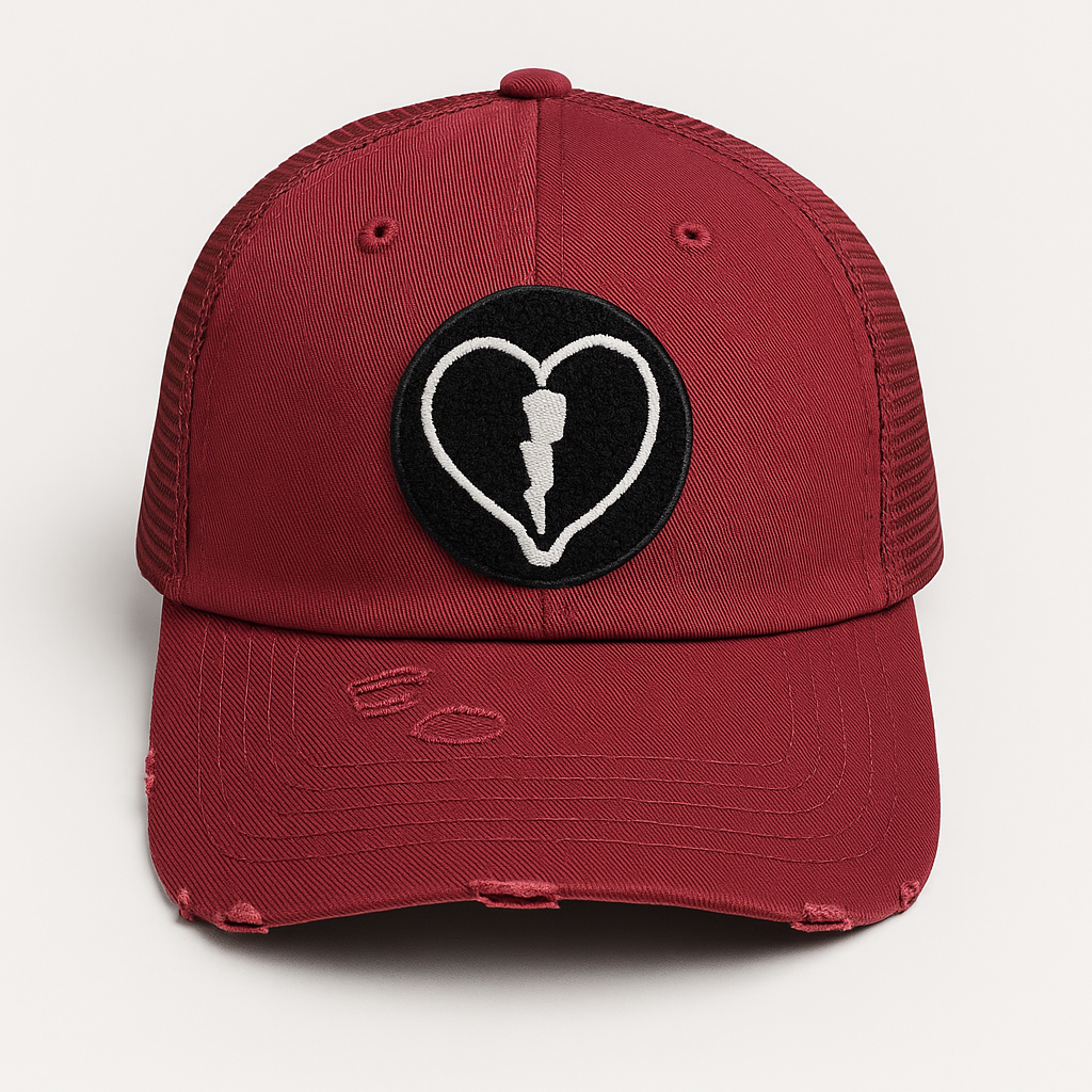 Distressed garnet mesh back cap featuring the official Liveblackheart chenille heart and lightning bolt logo, lifestyle streetwear brand Every Heart Has A Story.