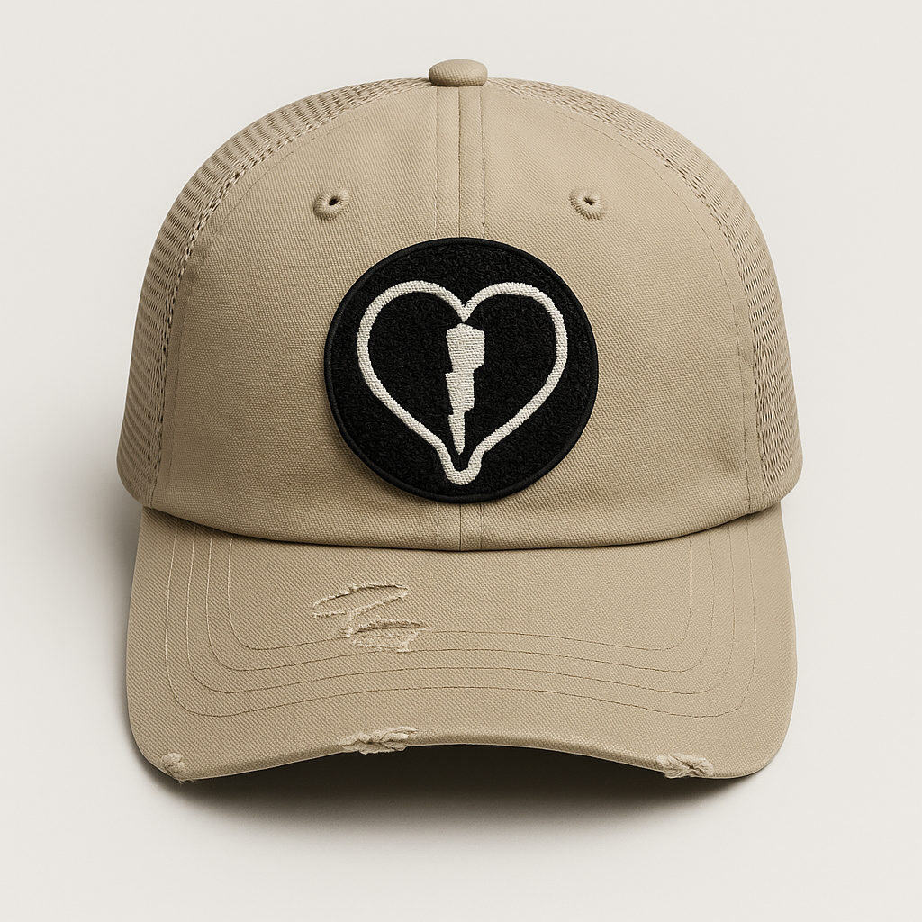 Distressed khaki mesh back cap featuring the official Liveblackheart chenille heart and lightning bolt logo, lifestyle streetwear brand Every Heart Has A Story.