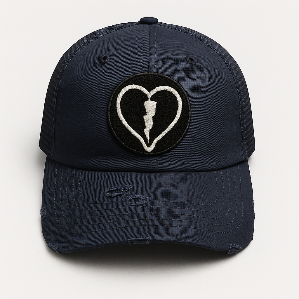 Distressed navy mesh back cap featuring the official Liveblackheart chenille heart and lightning bolt logo, lifestyle streetwear brand Every Heart Has A Story.