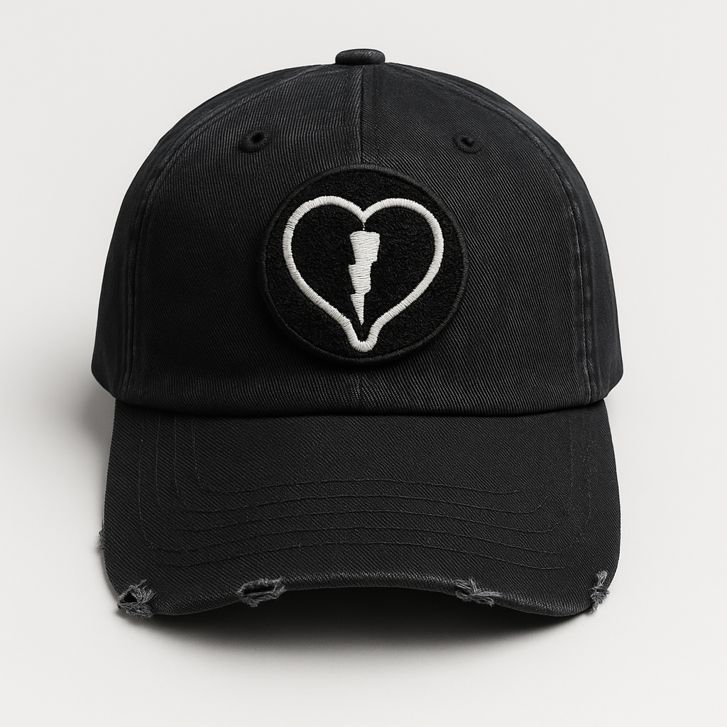 Distressed vintage black cap featuring the official Liveblackheart chenille heart and lightning bolt logo, lifestyle streetwear brand Every Heart Has A Story.
